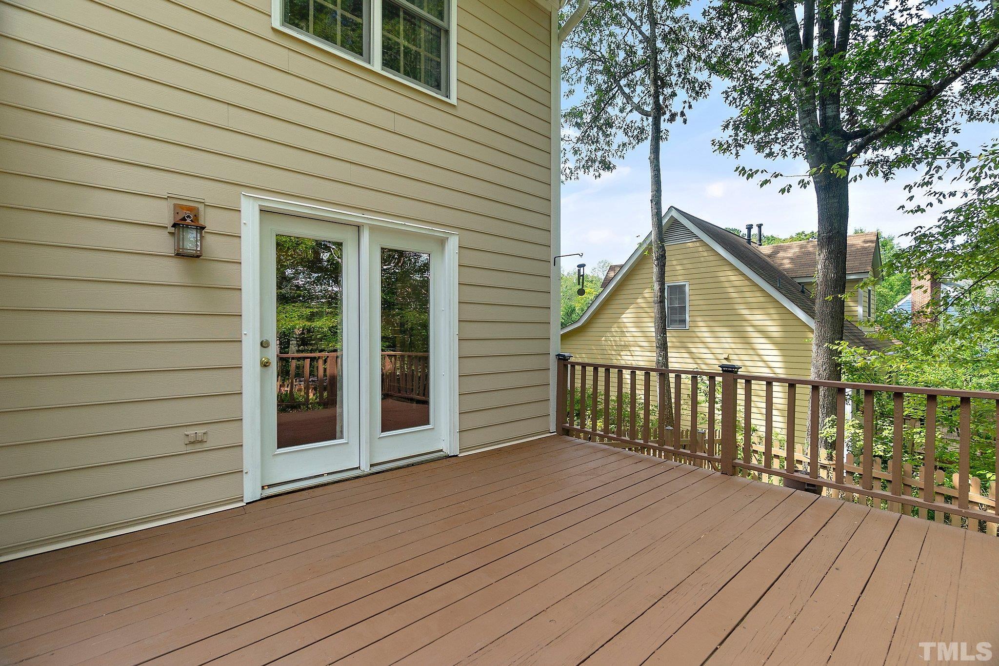 612 Morningside Drive Durham, NC 27713 - Photo 30 of 36 a view of a house with a wooden deck