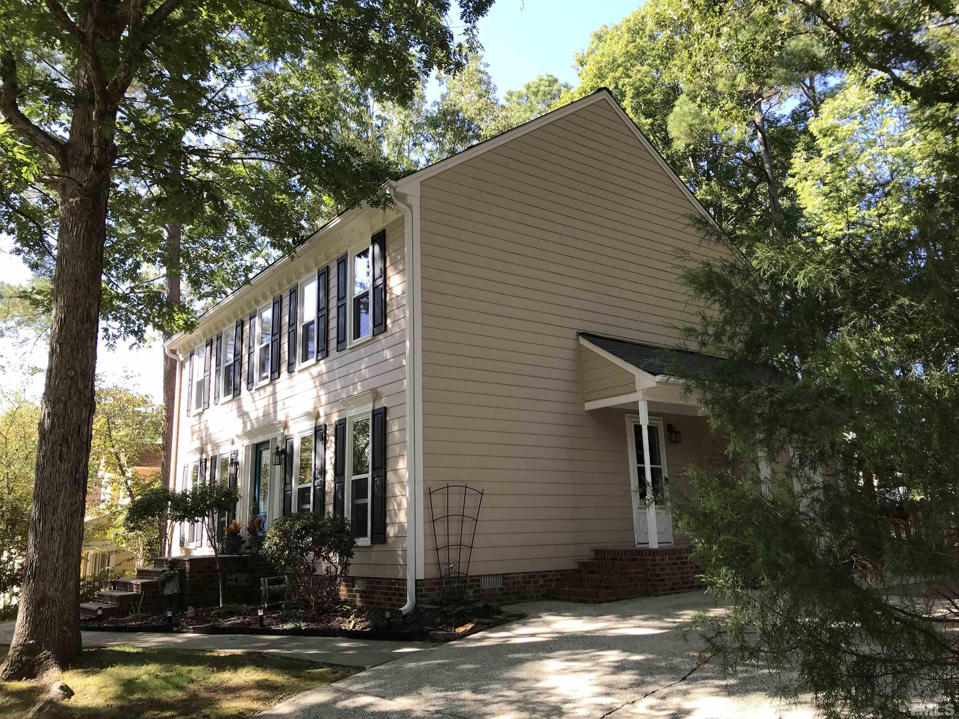 612 Morningside Drive Durham, NC 27713 - Photo 3 of 36 a front view of a house with street