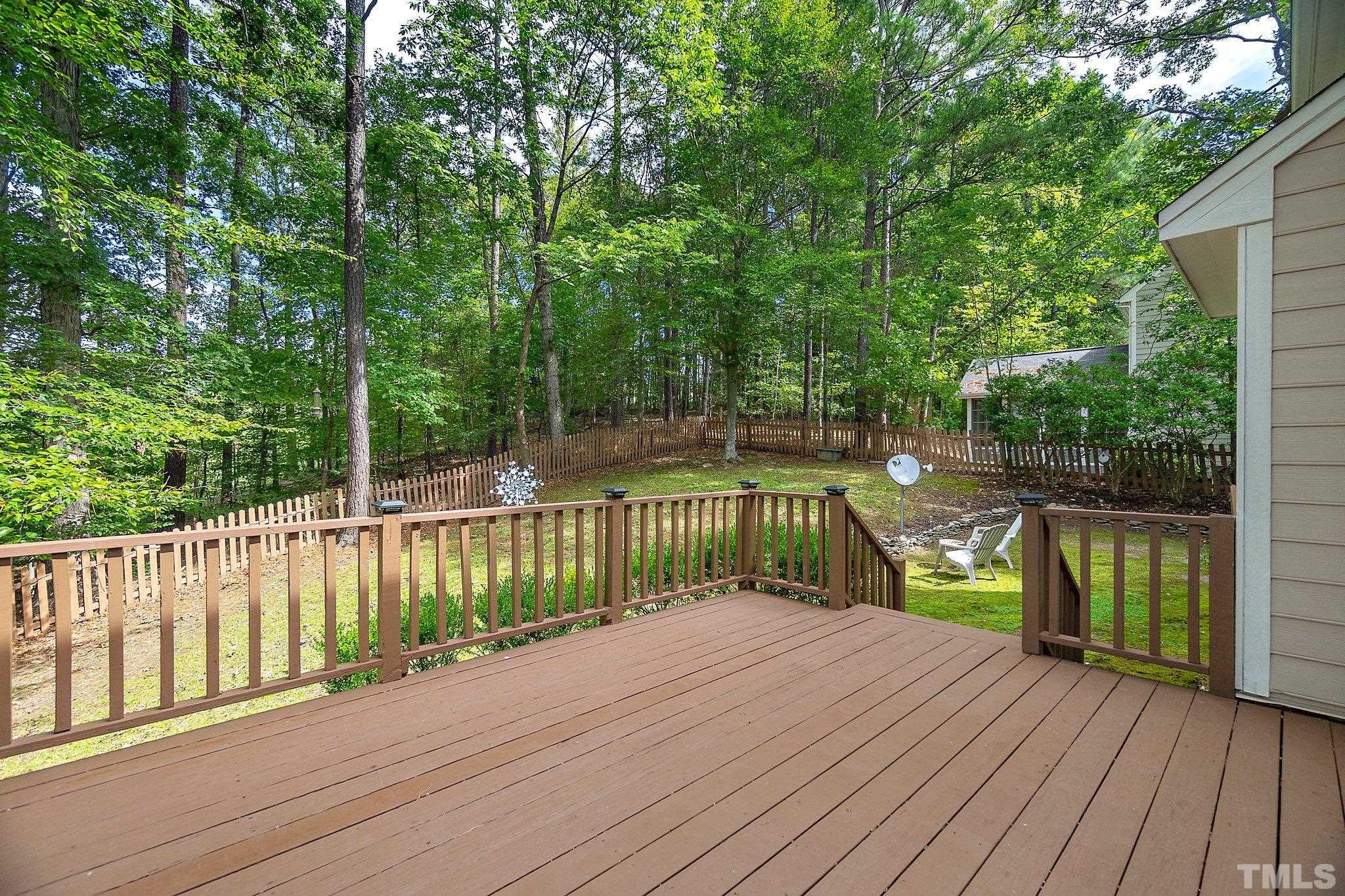 612 Morningside Drive Durham, NC 27713 - Photo 32 of 36 a balcony with trees in front of it