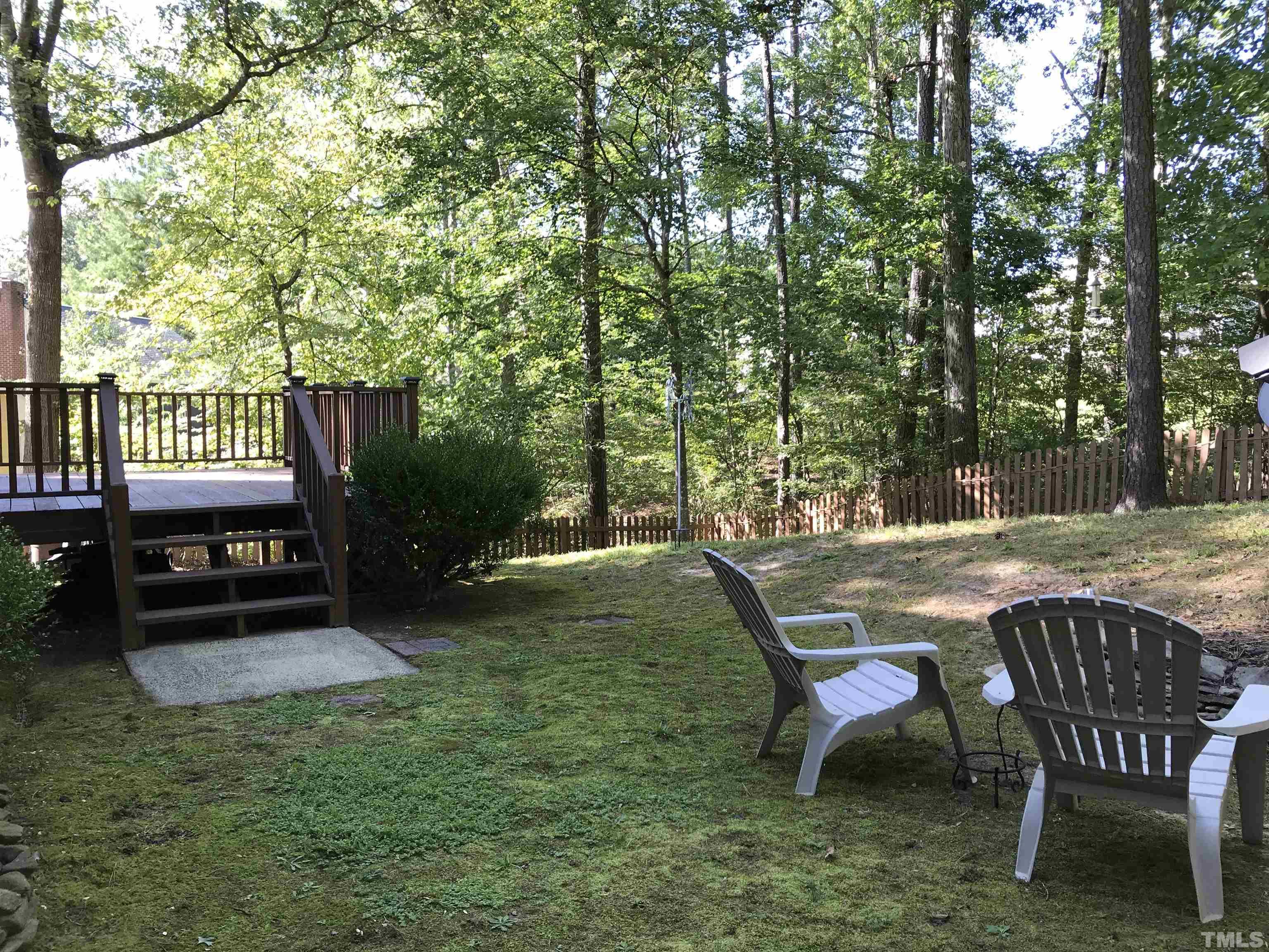 612 Morningside Drive Durham, NC 27713 - Photo 33 of 36 a backyard of a house with table and chairs