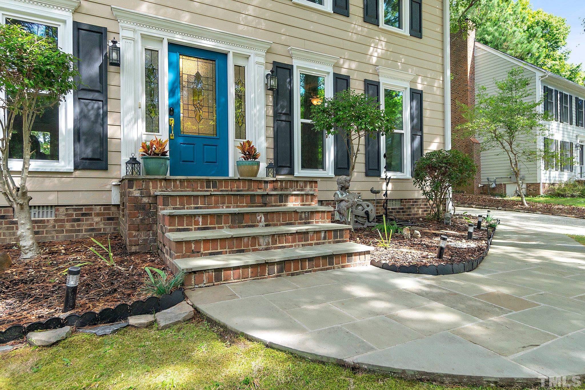 612 Morningside Drive Durham, NC 27713 - Photo 5 of 36 a view of a house with backyard and sitting area