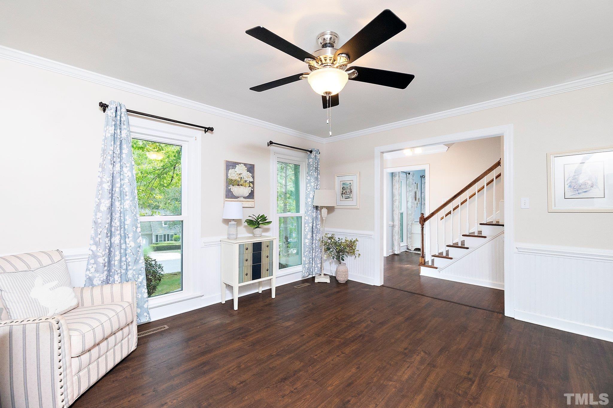 612 Morningside Drive Durham, NC 27713 - Photo 8 of 36 a view of an empty room with wooden floor and a window