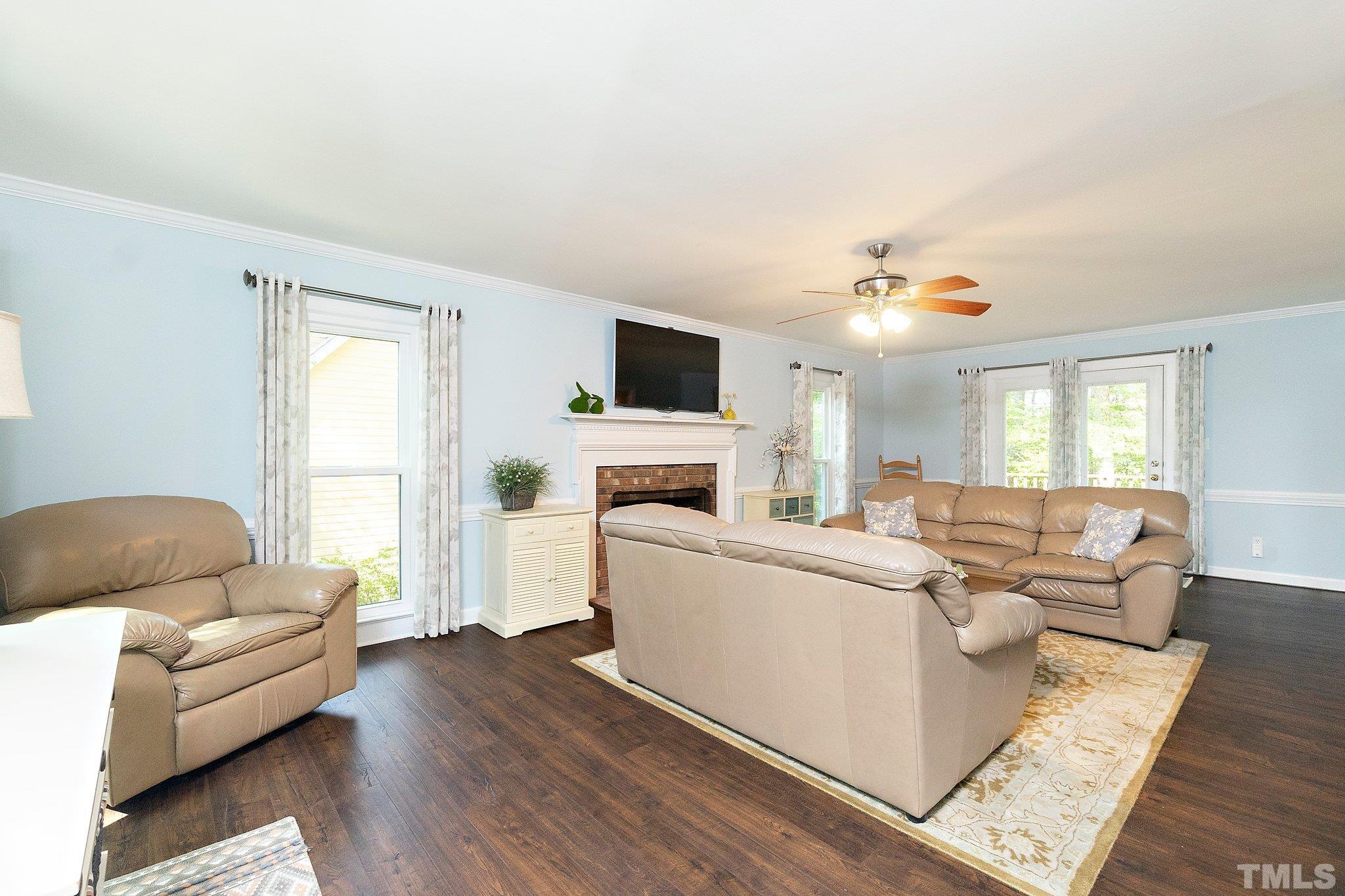 612 Morningside Drive Durham, NC 27713 - Photo 9 of 36 a living room with furniture and a fireplace
