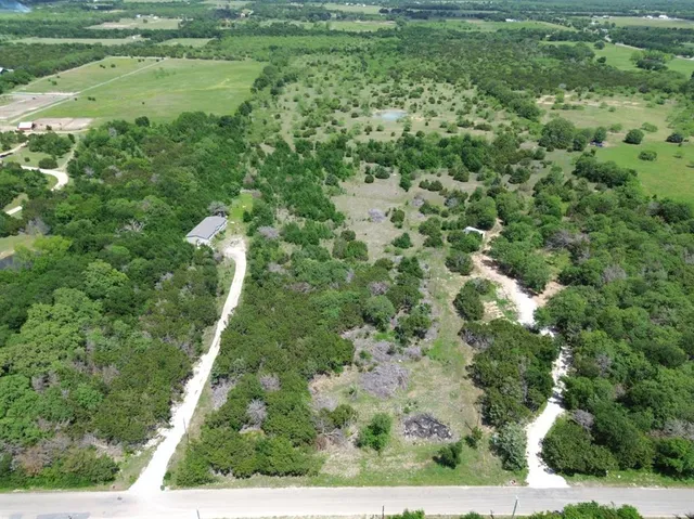 a view of a yard with an outdoor space