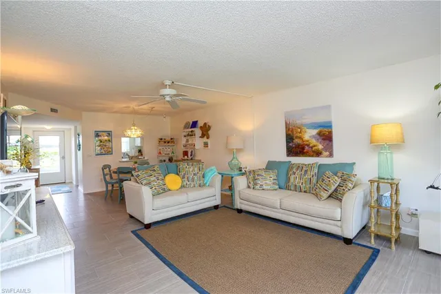 a living room with furniture and a couch