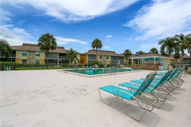 front view of a house with a swimming pool