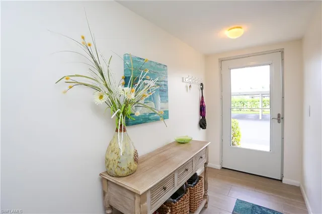 a view of living room with window and wooden floor