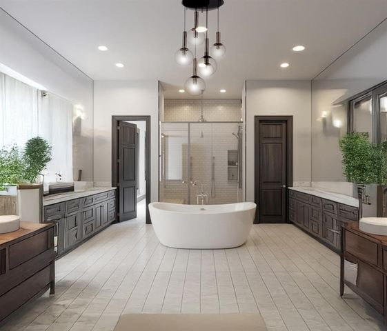 a large spacious bathroom with a large tub shower and sink