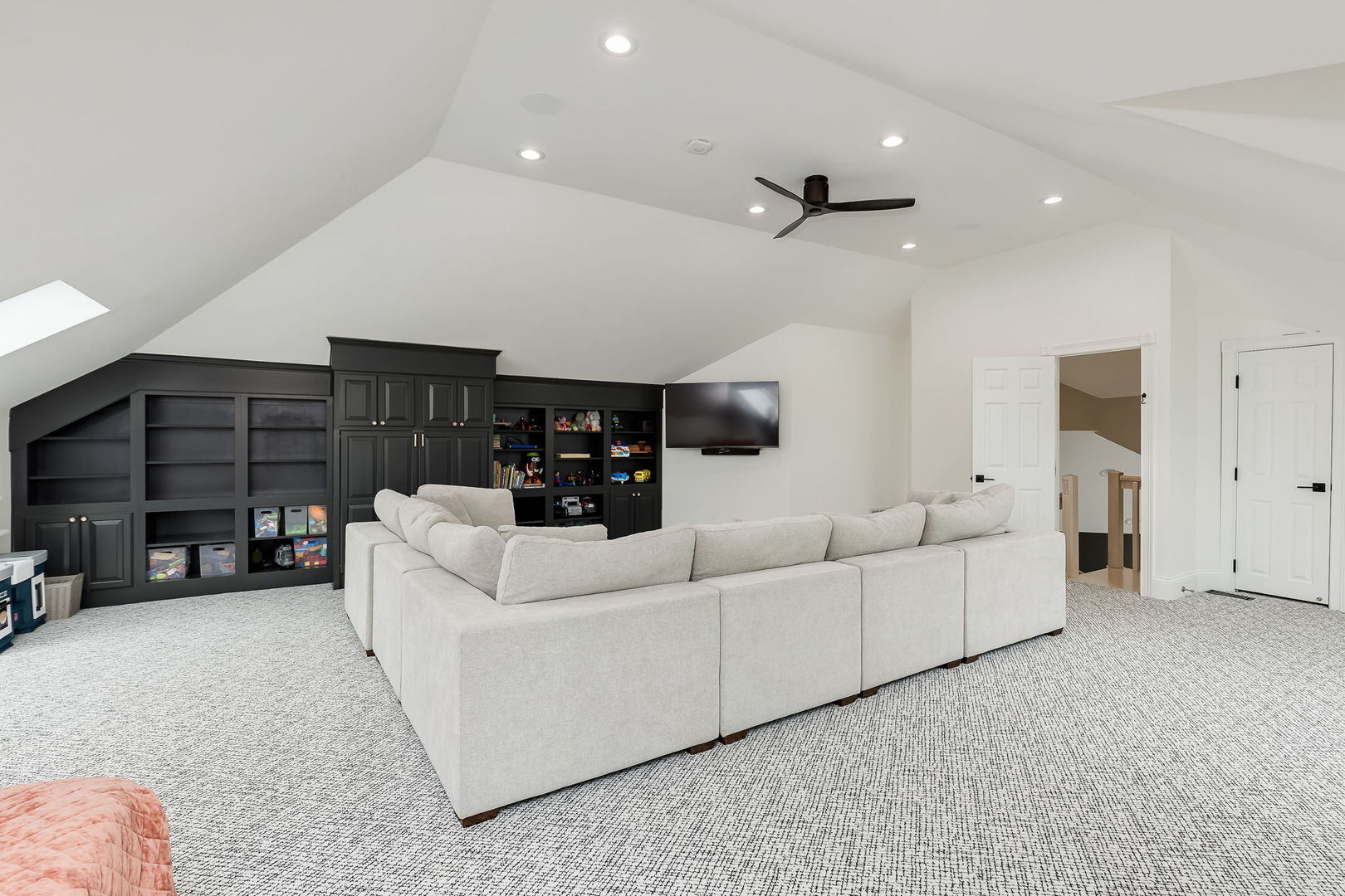 7 Loblolly Court Lemont, IL 60439 - Photo 27 of 45 a living room with furniture and a flat screen tv