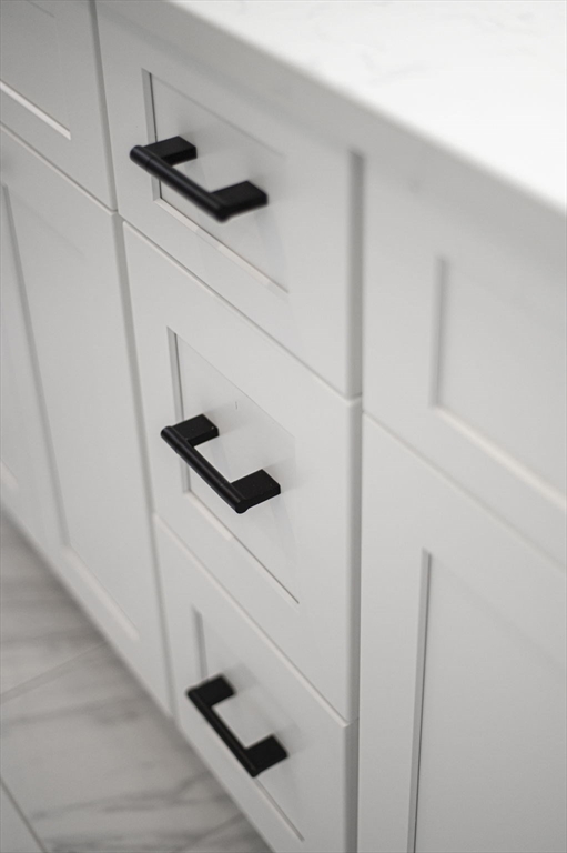 9 Acton Road, Unit 6 Chelmsford, MA 01824 - Photo 12 of 20 a close view of sink washer and dryer