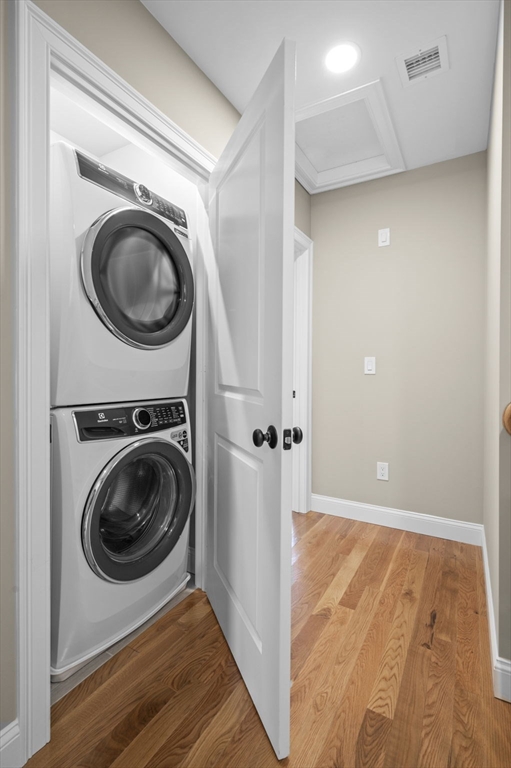 9 Acton Road, Unit 6 Chelmsford, MA 01824 - Photo 15 of 20 a view of a hallway with washer and dryer