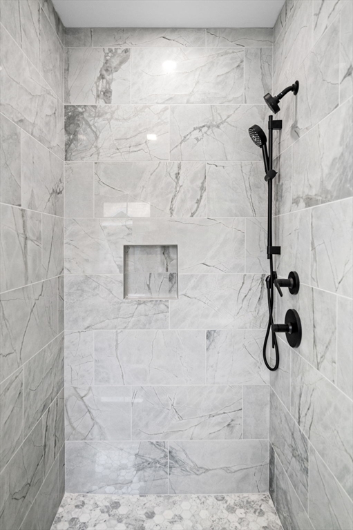 9 Acton Road, Unit 6 Chelmsford, MA 01824 - Photo 18 of 21 a bathroom with a shower