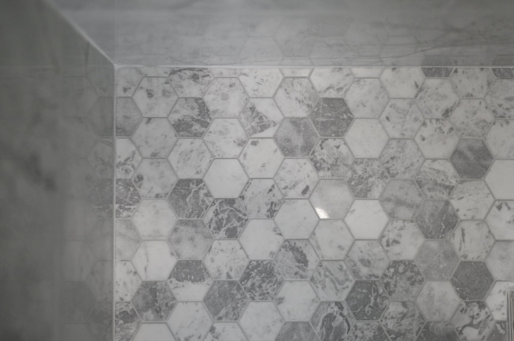 9 Acton Road, Unit 6 Chelmsford, MA 01824 - Photo 18 of 20 a close view of a shower