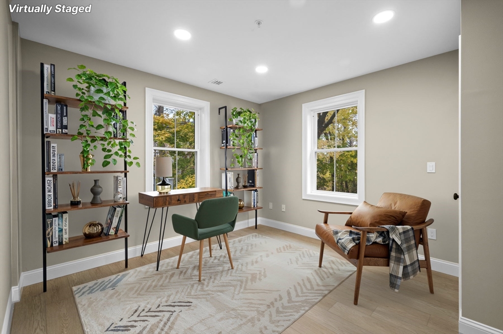 9 Acton Road, Unit 6 Chelmsford, MA 01824 - Photo 7 of 21 a living room with furniture and a window