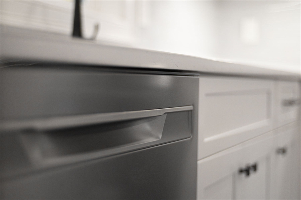 9 Acton Road, Unit 6 Chelmsford, MA 01824 - Photo 9 of 21 a close view of closet