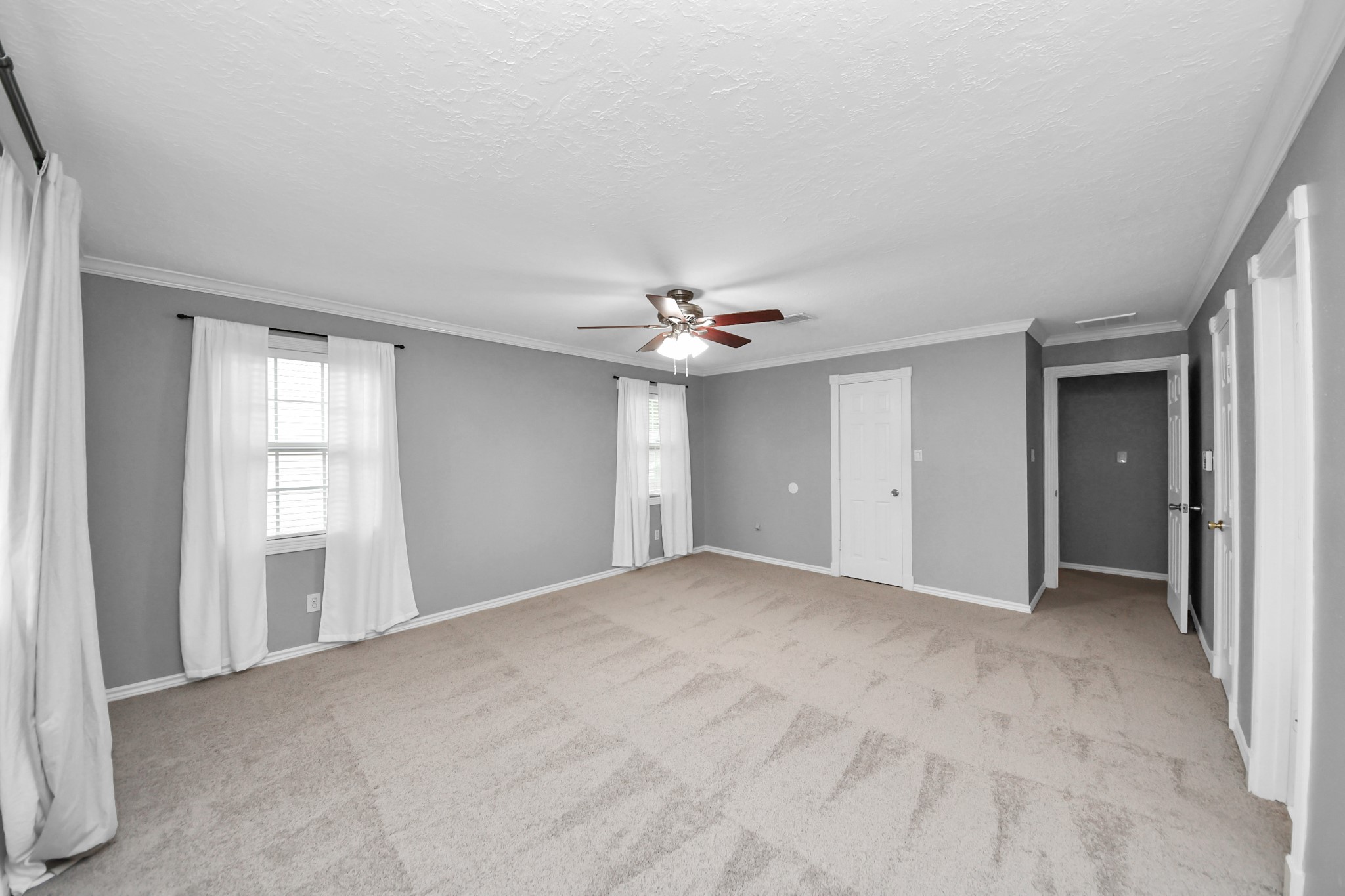 1719 Saddlecreek Drive Houston, TX 77090 - Photo 20 of 38 a view of an empty room with a window