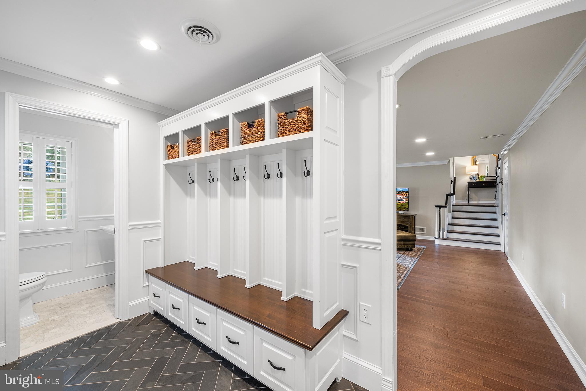 1012 Tenby Road Berwyn, PA 19312 - Photo 13 of 32 mudroom with cubbies, powder room