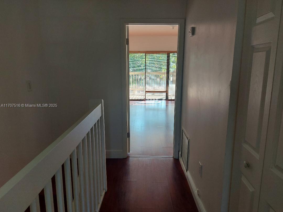 20033 Northeast 2nd Place, Unit 20033 Miami, FL 33179 - Photo 15 of 26 a view of a hallway