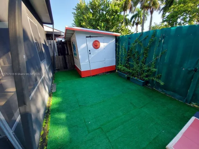 a view of an outdoor space with yard