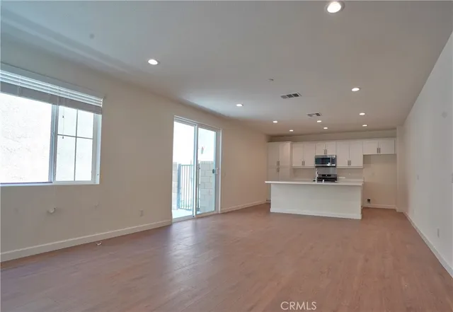 a view of kitchen and windows