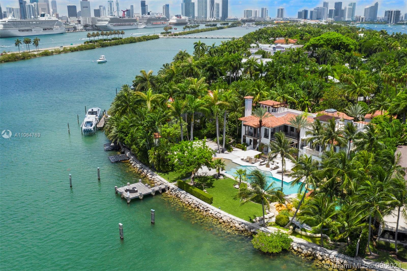 10 Palm Avenue Miami Beach, FL 33139 - Photo 2 of 42 a view of a lake with a house