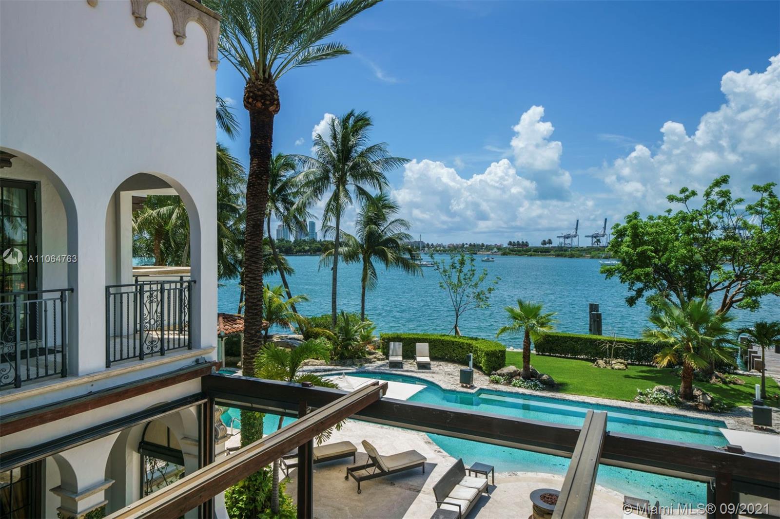 10 Palm Avenue Miami Beach, FL 33139 - Photo 12 of 42 a view of yard from deck having patio
