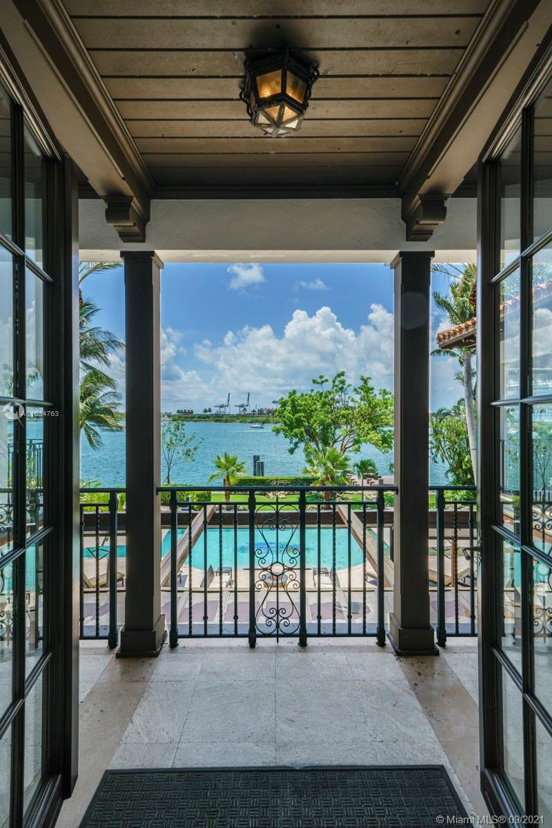 10 Palm Avenue Miami Beach, FL 33139 - Photo 17 of 42 a view of a balcony with furniture