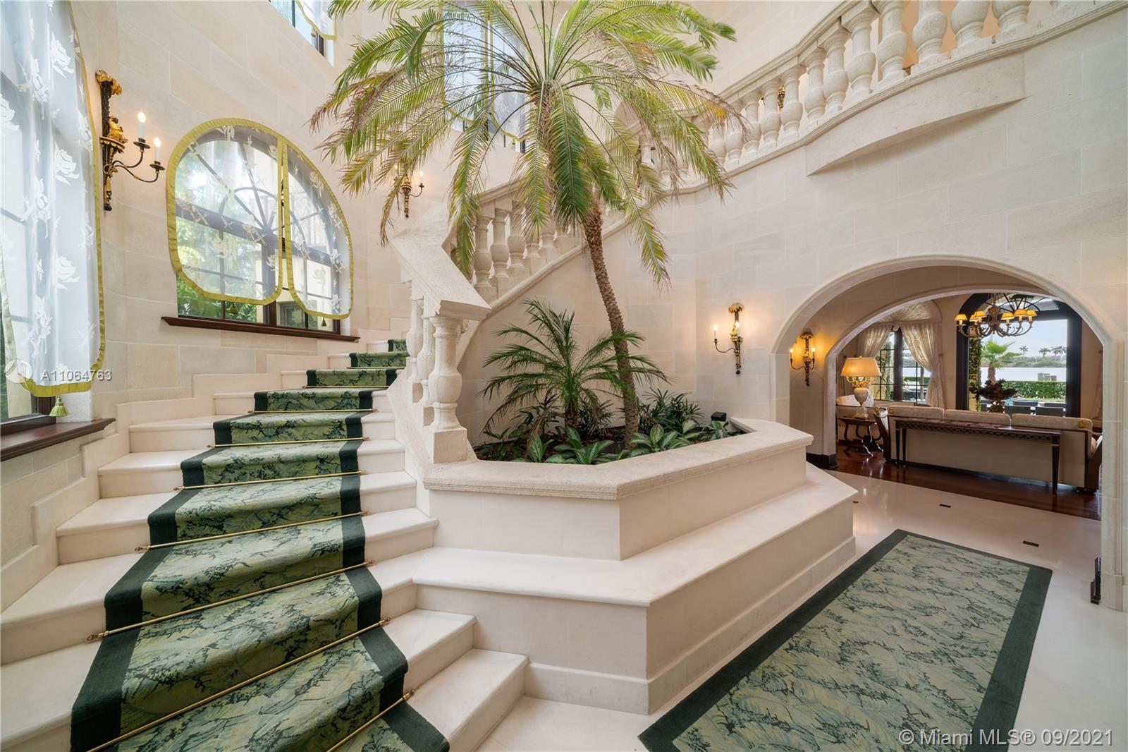10 Palm Avenue Miami Beach, FL 33139 - Photo 19 of 42 a view of entryway and hall with wooden floor