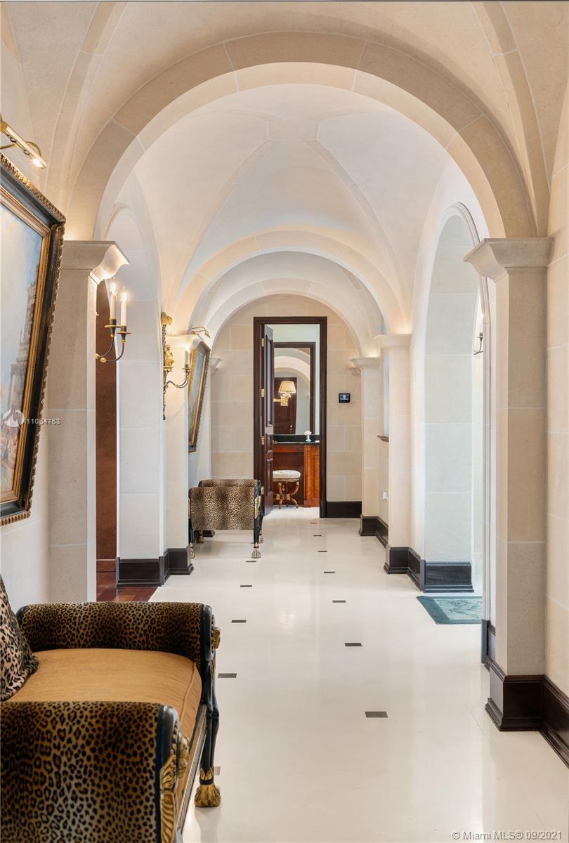 10 Palm Avenue Miami Beach, FL 33139 - Photo 20 of 42 a living room with furniture and a large window