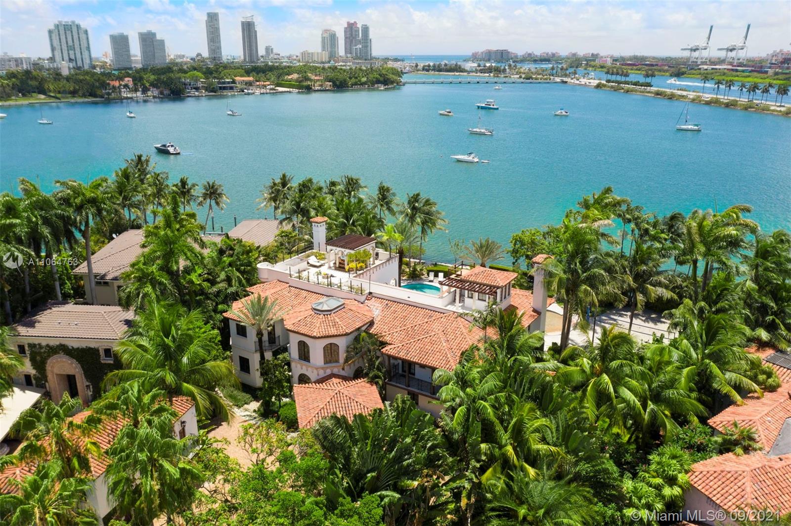 10 Palm Avenue Miami Beach, FL 33139 - Photo 3 of 42 an aerial view of ocean and residential houses with outdoor space and seating