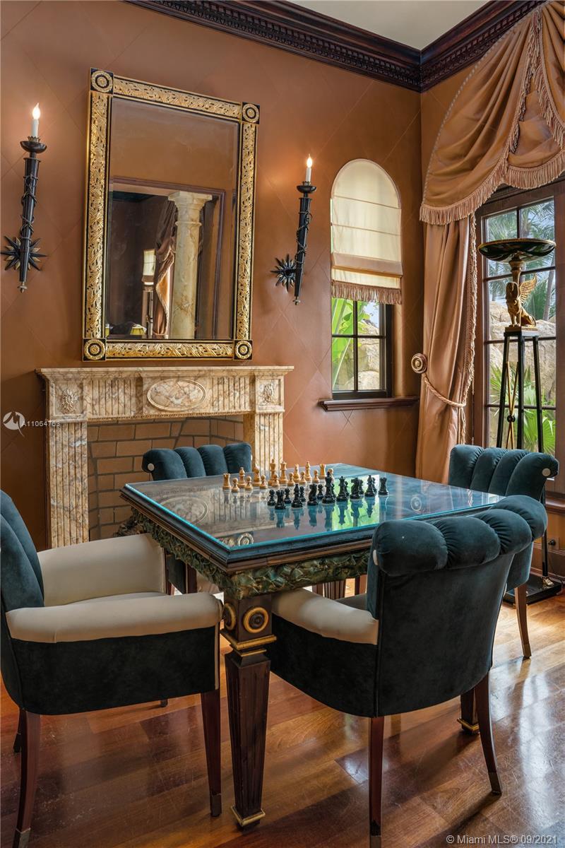 10 Palm Avenue Miami Beach, FL 33139 - Photo 25 of 42 a living room with furniture and a wooden floor
