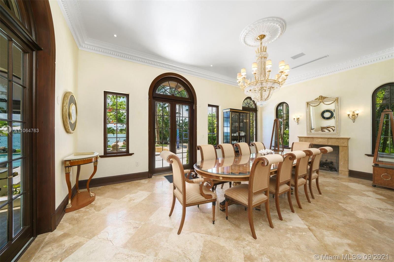 10 Palm Avenue Miami Beach, FL 33139 - Photo 26 of 42 a view of a dining room with furniture window and outside view
