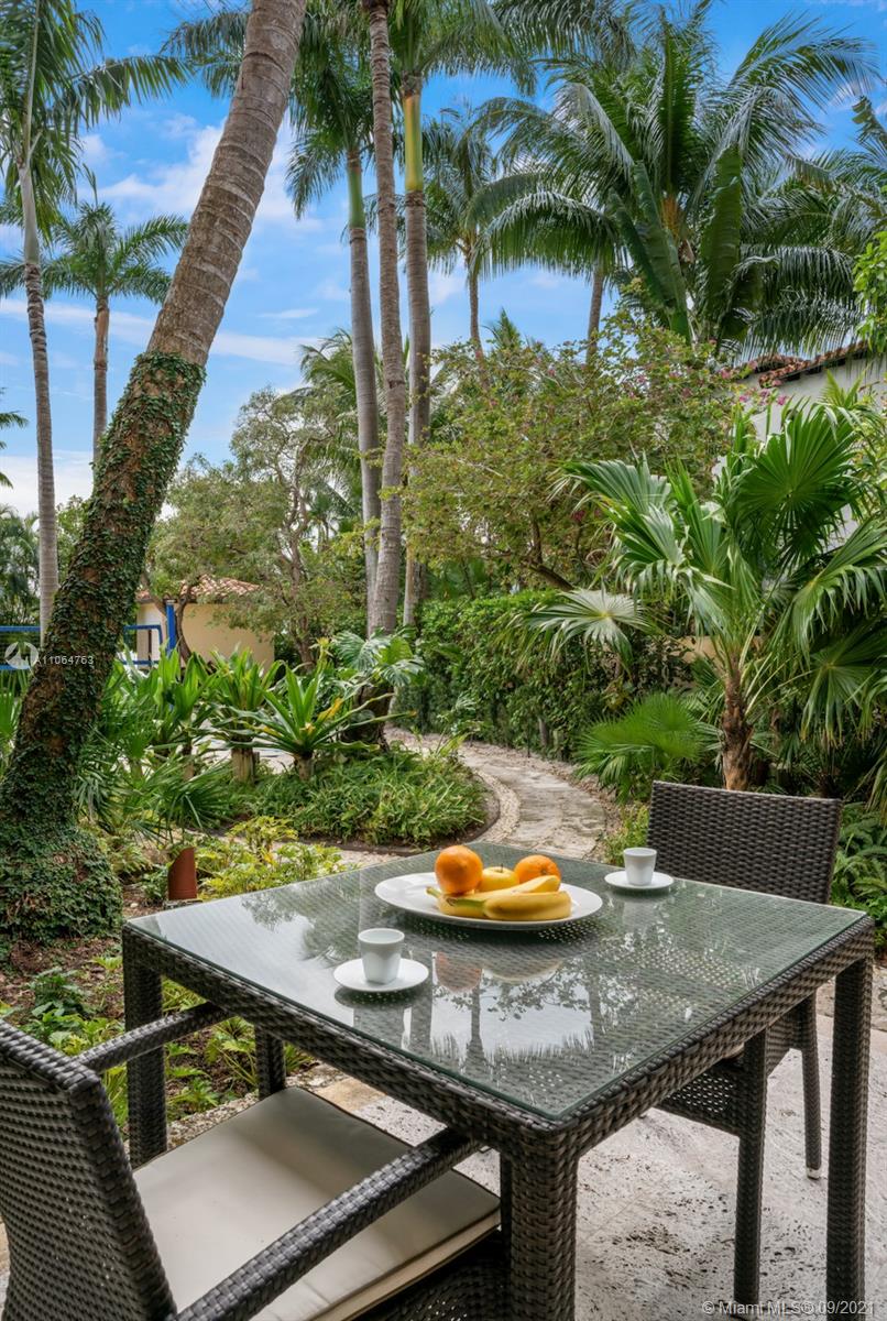 10 Palm Avenue Miami Beach, FL 33139 - Photo 35 of 42 a view of a backyard with furniture and a tub