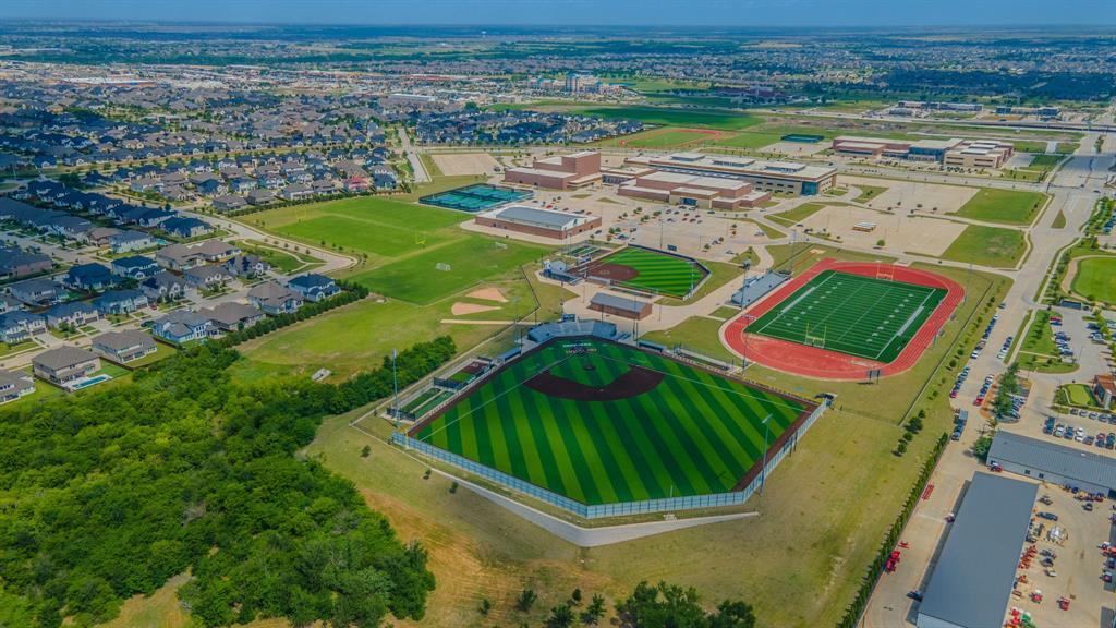 2521 Maidenhair Road Frisco, TX 75033 - Photo 34 of 39 Aerial view of a residential community surrounding a multi-sport athletic complex