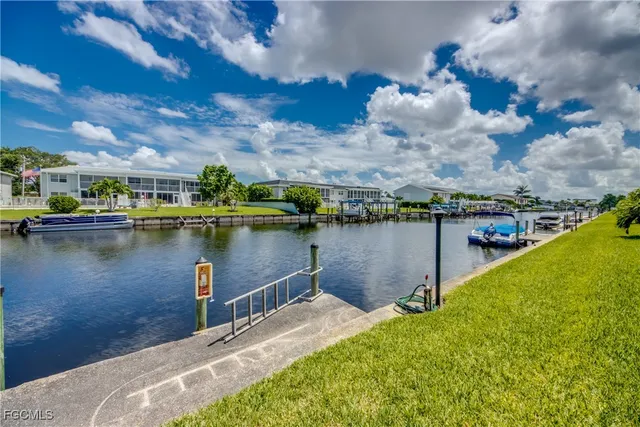 a view of a lake with a house