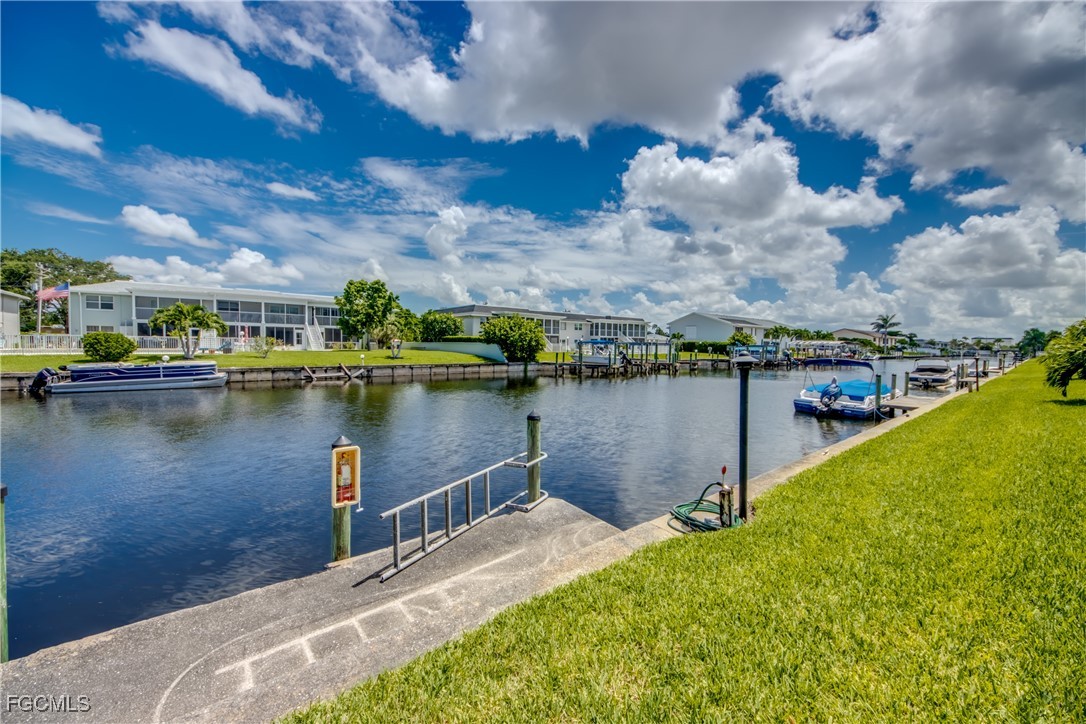 909 Southeast 46th Lane, Unit 202 Cape Coral, FL 33904 - Photo 30 of 38 a lake view