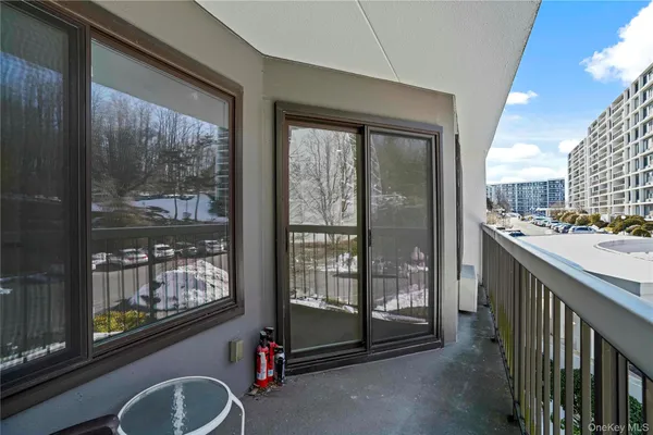 a room with gym equipment and a large window