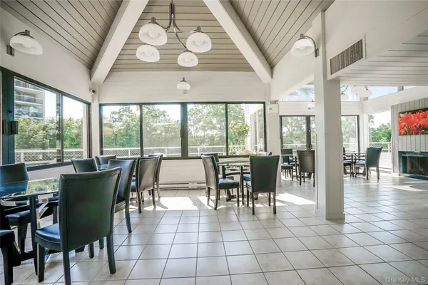 an outdoor space with seating area and furniture