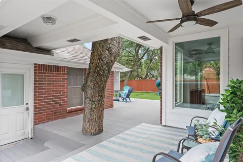 a outdoor space with patio the couches and a potted plant