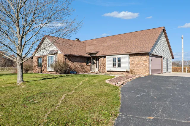 $600,000 | 4353 9 Mile Road Northwest, Sparta, MI 49345