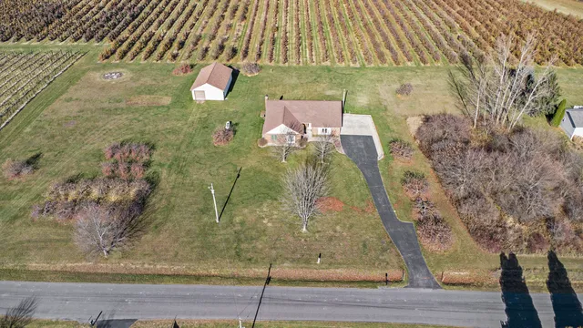 $600,000 | 4353 9 Mile Road Northwest, Sparta, MI 49345