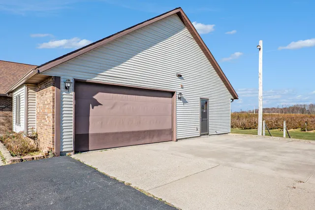 $600,000 | 4353 9 Mile Road Northwest, Sparta, MI 49345