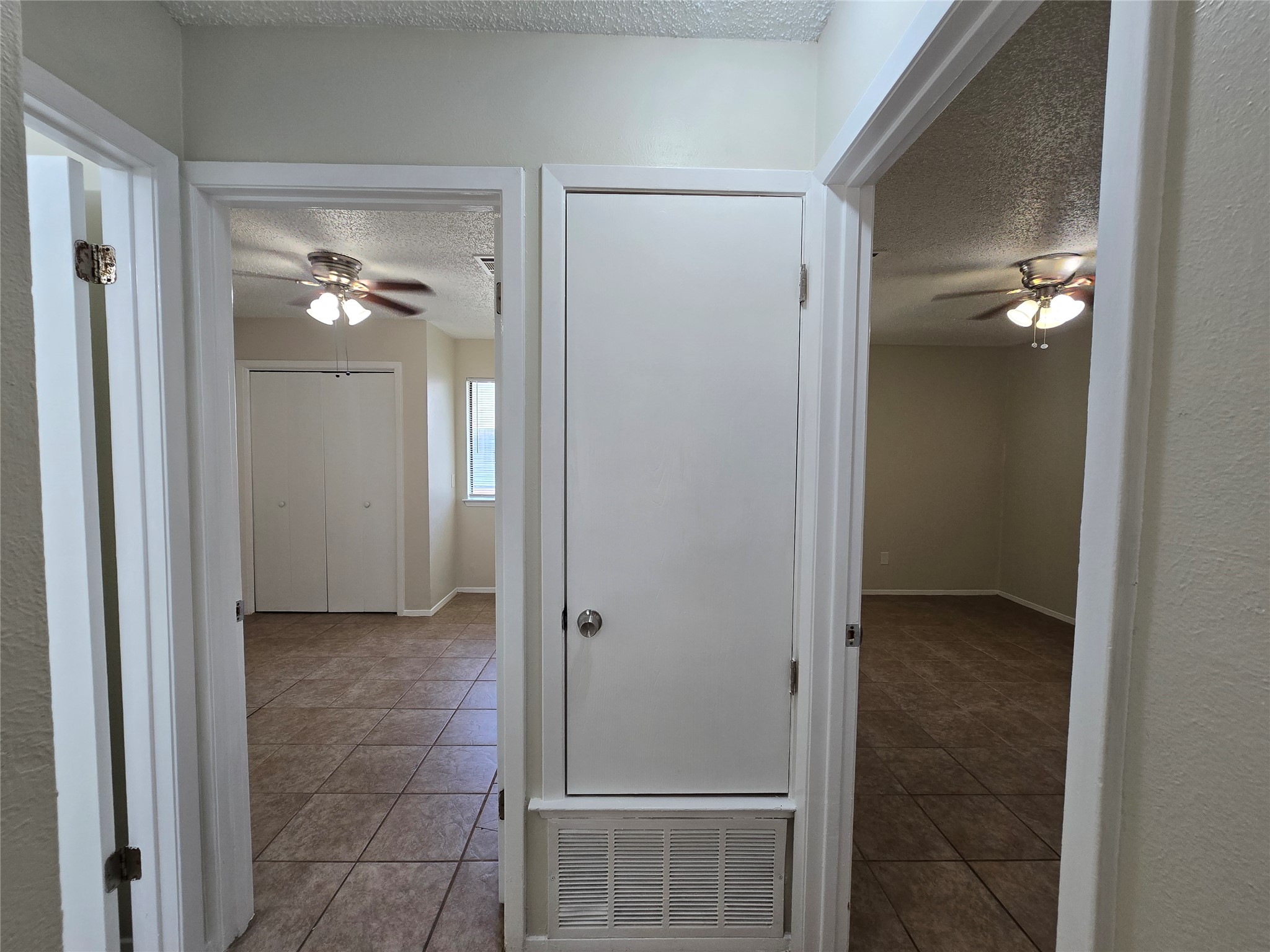 6206 Buffalo Pass, Unit A Austin, TX 78745 - Photo 11 of 24 Functional layout connecting versatile rooms with easy-to-maintain tile flooring.