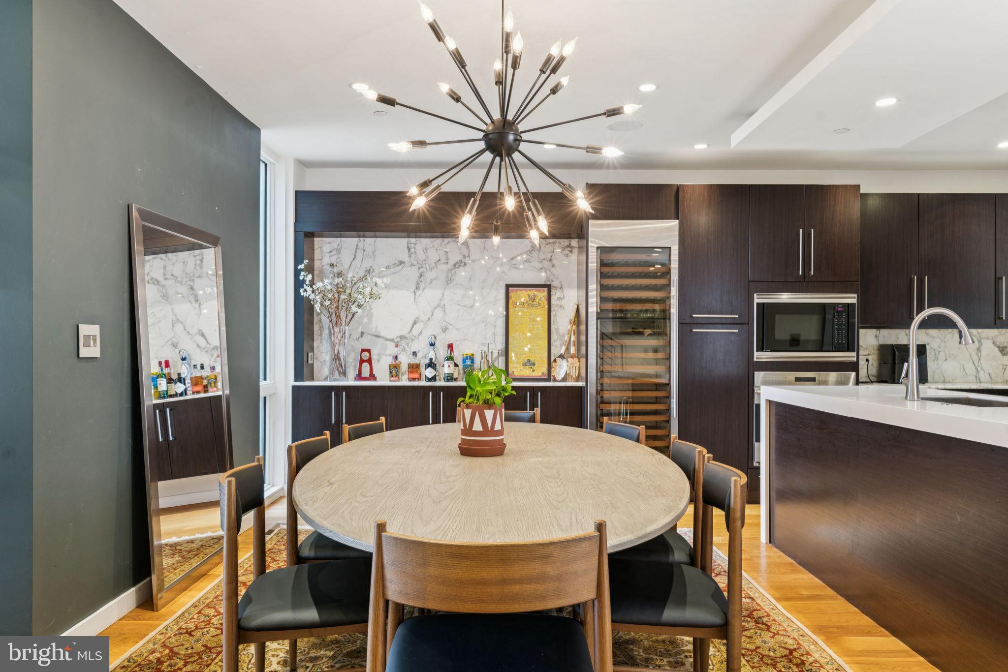 206 North 22nd Street, Unit E Philadelphia, PA 19103 - Photo 16 of 50 a view of a dining room with furniture window and outside view