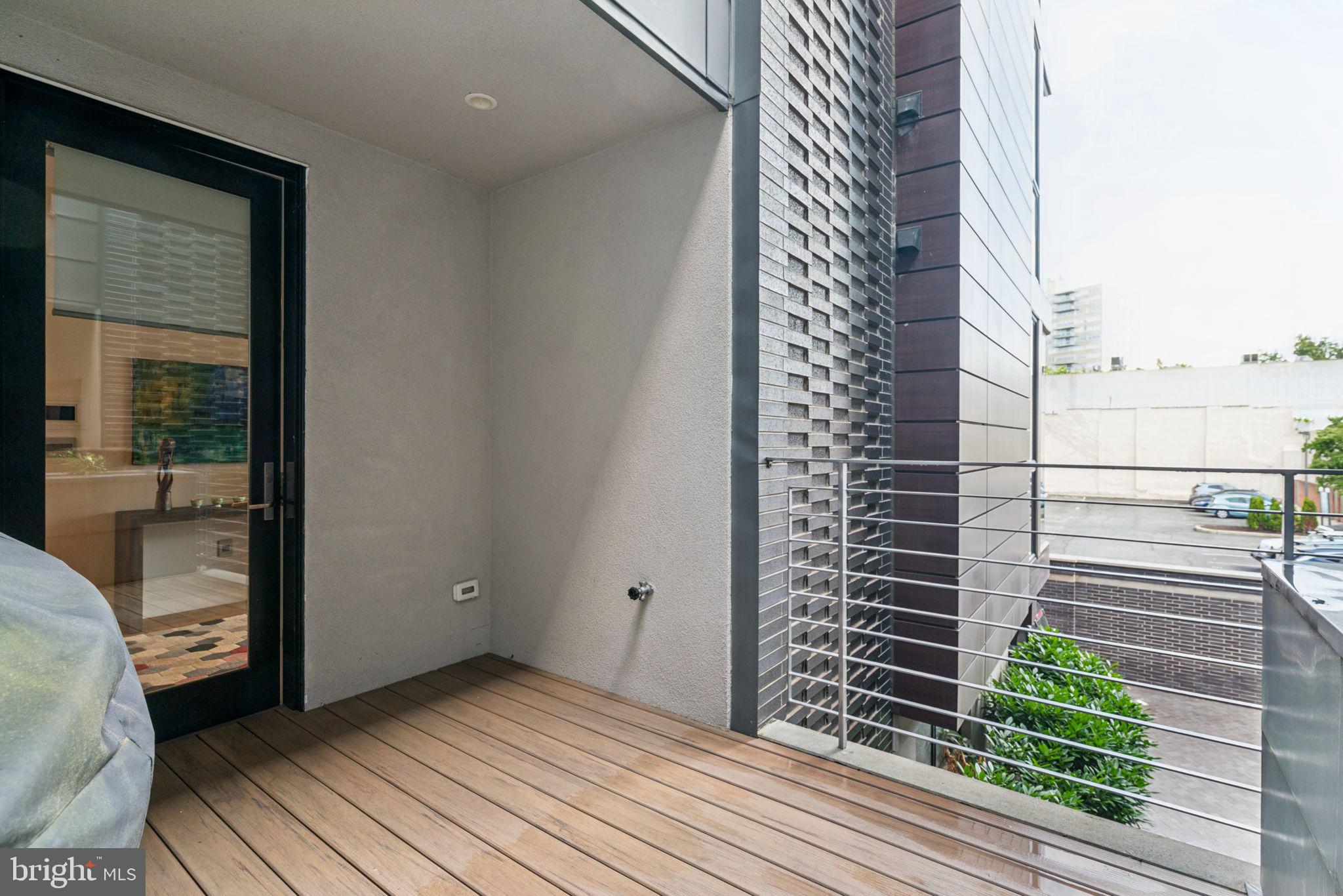 206 North 22nd Street, Unit E Philadelphia, PA 19103 - Photo 21 of 50 a view of balcony and wooden floor