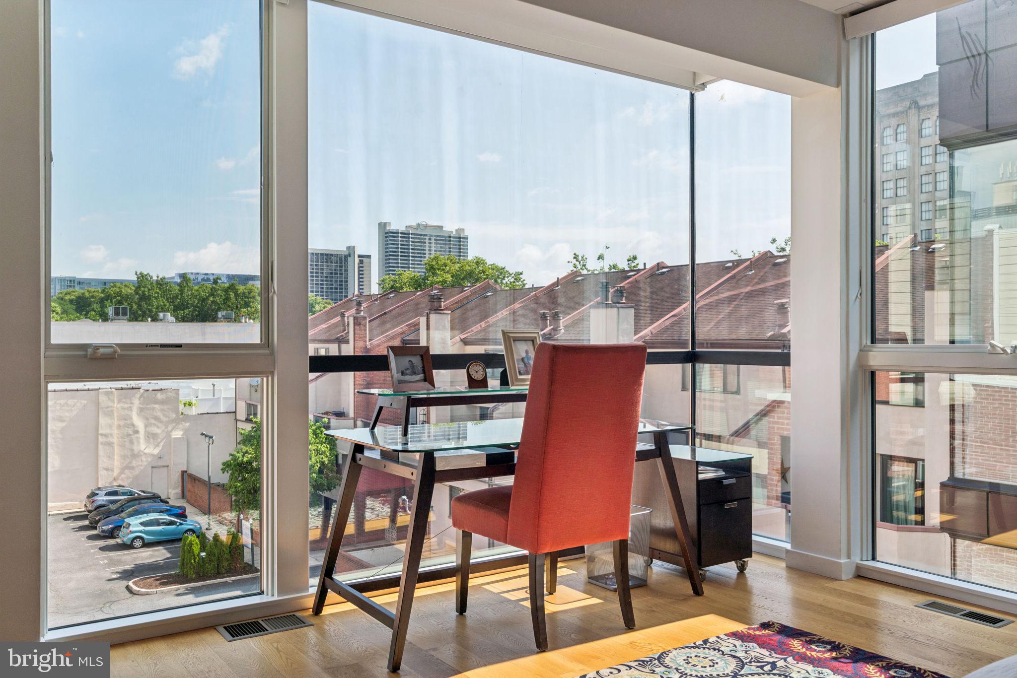 206 North 22nd Street, Unit E Philadelphia, PA 19103 - Photo 35 of 50 a view of a dining room with furniture window and wooden floor