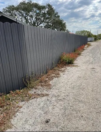 a view of a backyard of the house