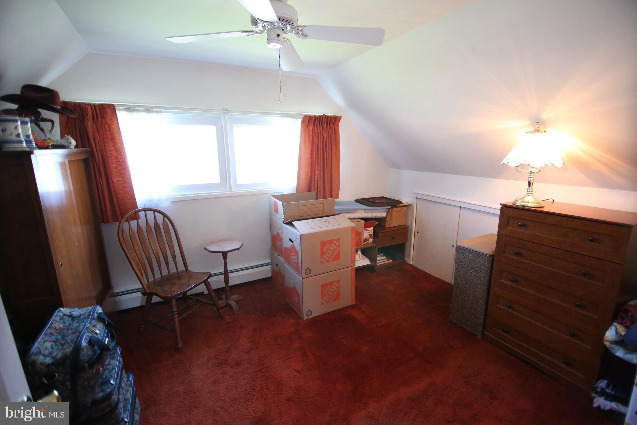 47 Trellis Road Levittown, PA 19056 - Photo 20 of 34 a view of a livingroom with furniture and a window