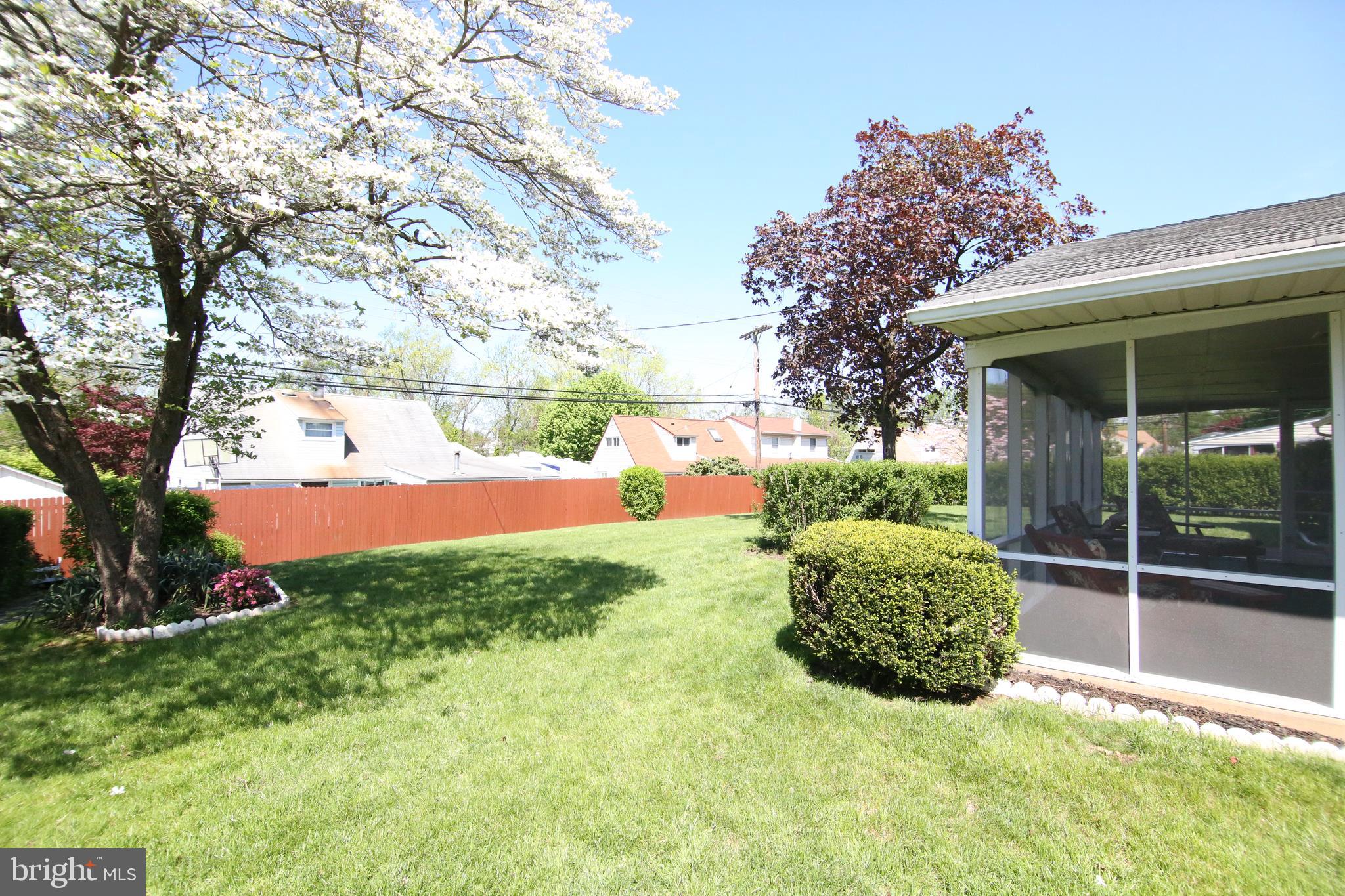 47 Trellis Road Levittown, PA 19056 - Photo 27 of 34 a view of a backyard with large trees