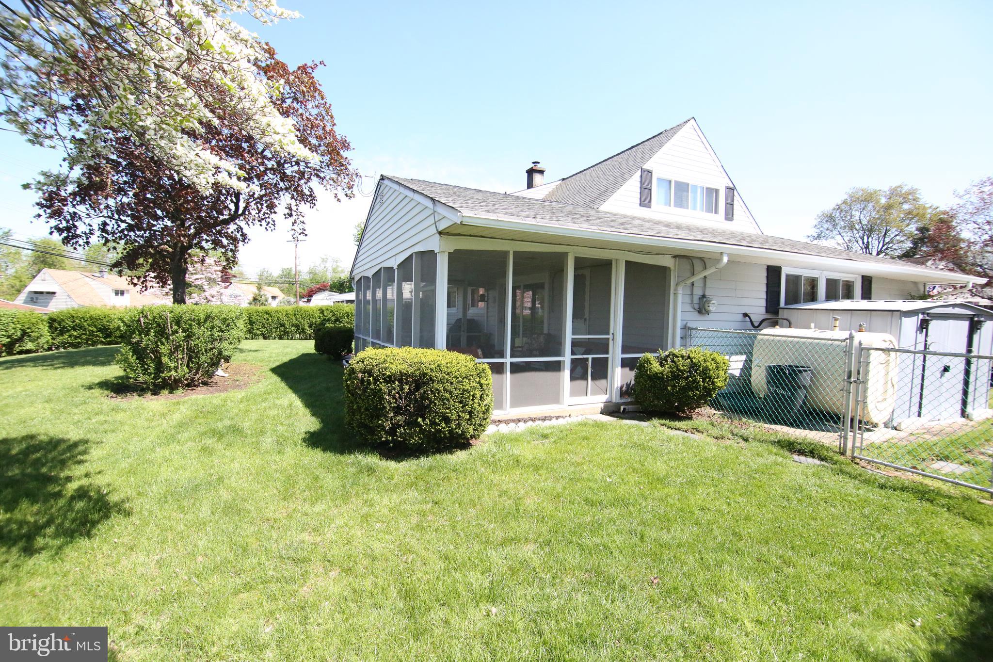47 Trellis Road Levittown, PA 19056 - Photo 28 of 34 a view of a house with a yard and sitting area